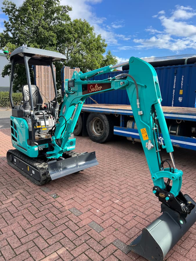 teal blue digger machine